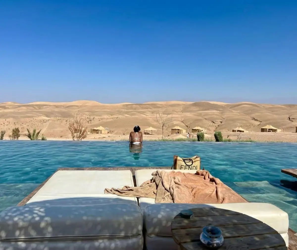 Infinity pool overlooking the Agafay Desert hills