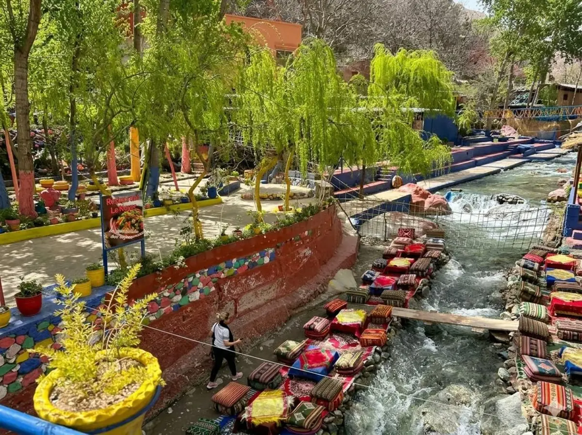 Lunch terraces over the Ourika River among green trees