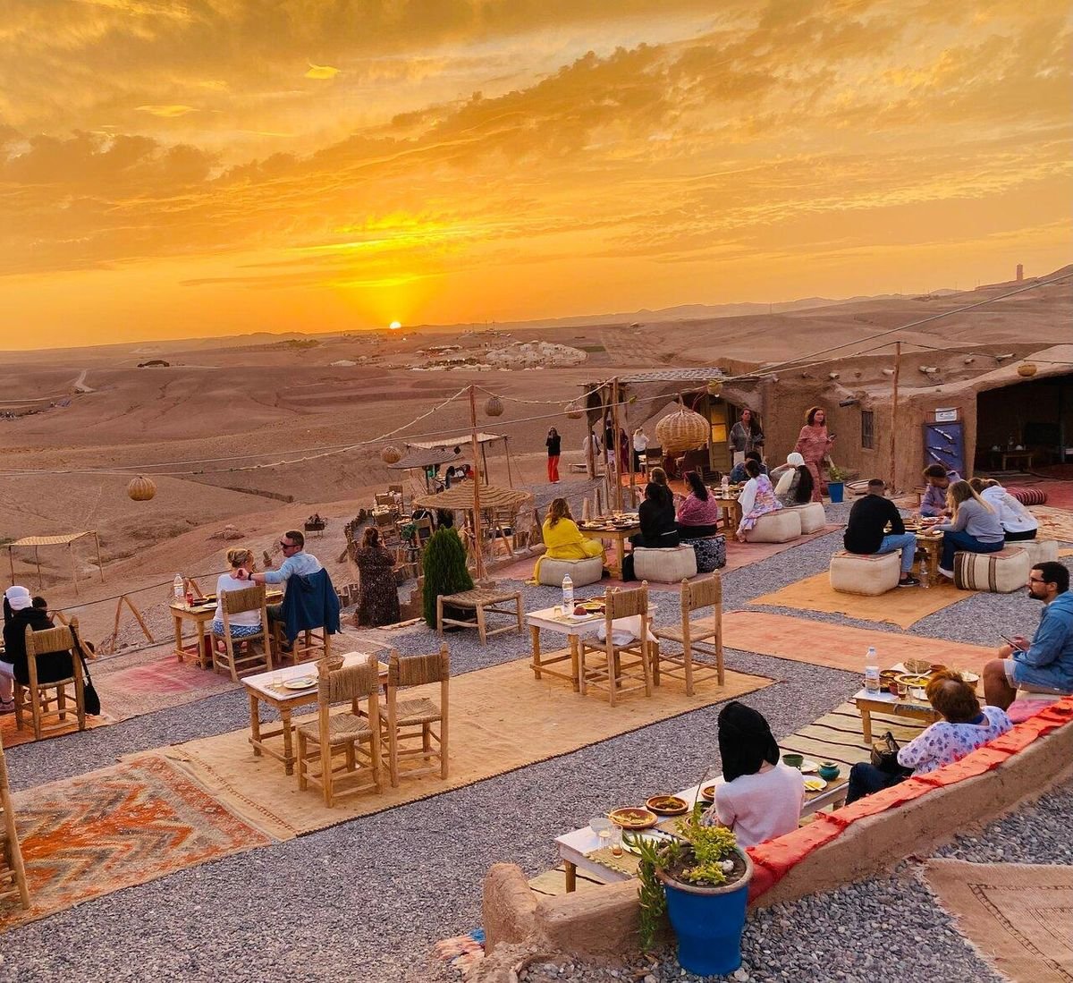 Sunset over the lounge area of the Agafay camp